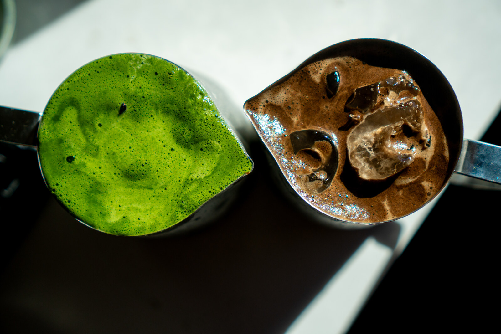 Matcha and hojicha overhead — the R&D bench